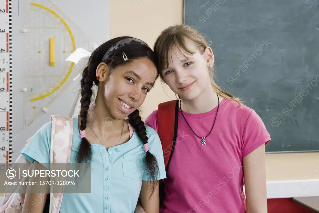 Two schoolgirls side by side