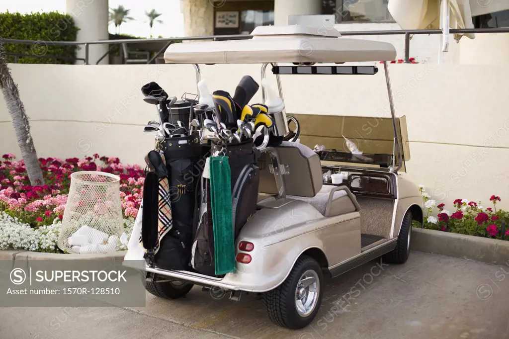 Golf cart in a parking lot