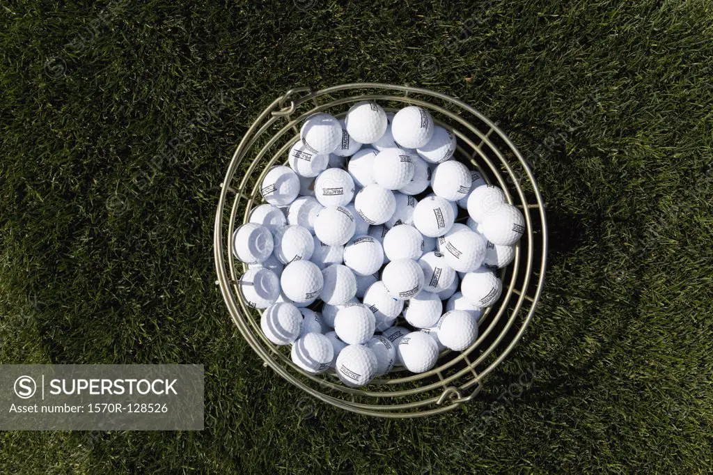 A bucket of golf balls