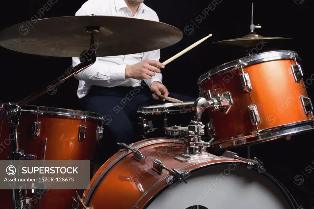Detail of a man playing drums