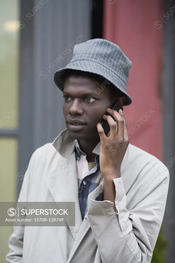 A young man using a mobile phone