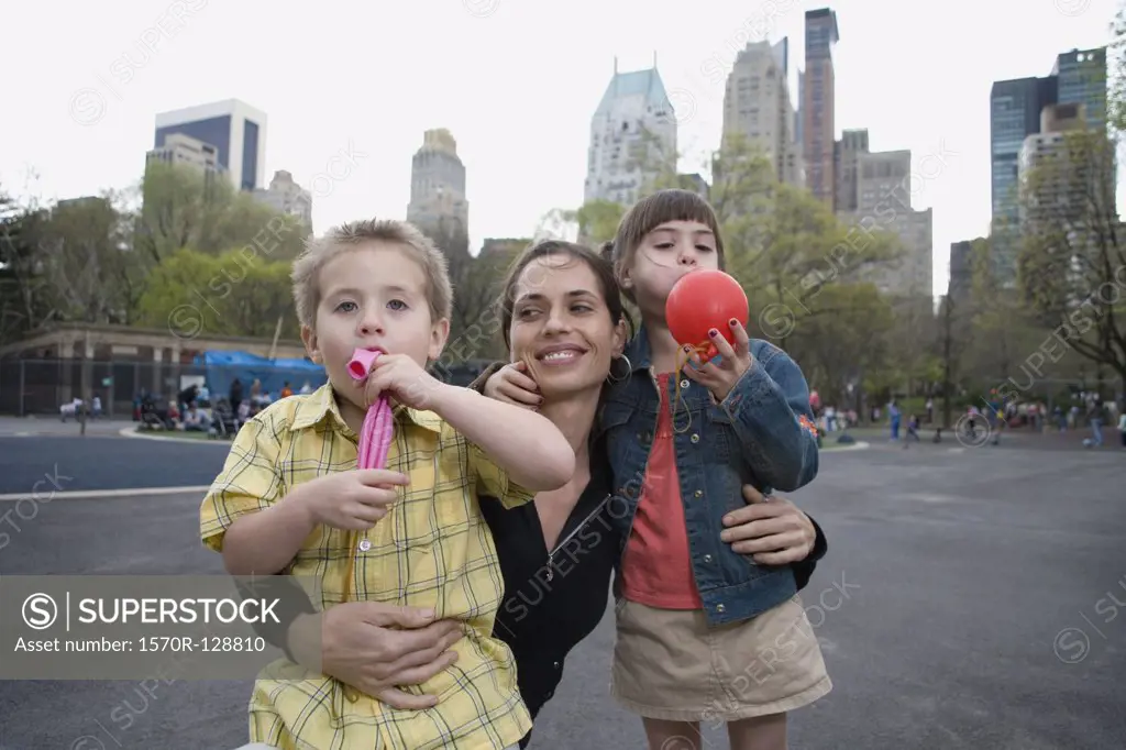 A woman with her children in Central Park, New York City