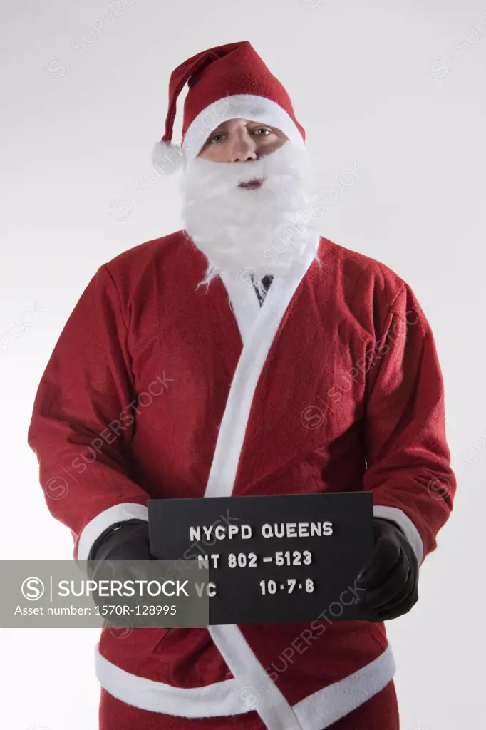 Santa Claus posing for a mug shot