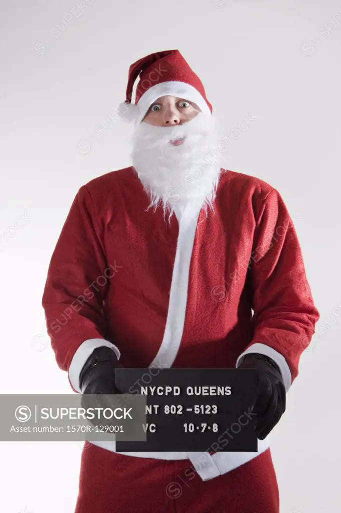 Santa Claus posing for a mug shot