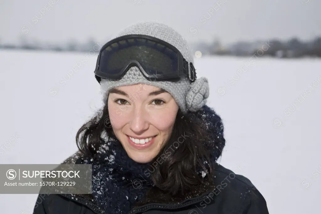 A woman outdoors in winter, head and shoulders, portrait