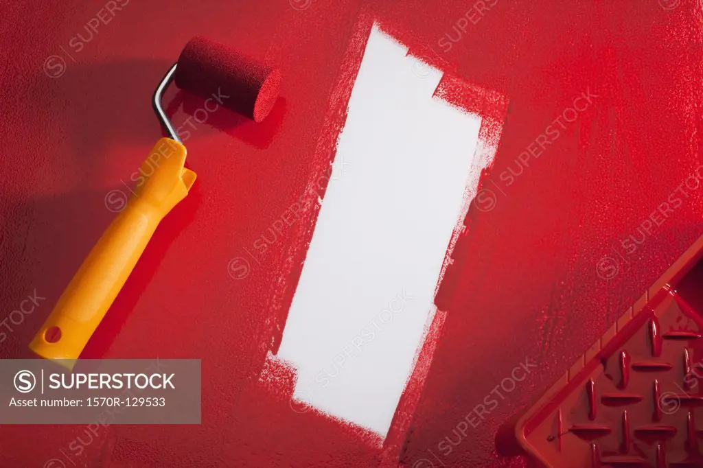 A Paint Roller With Red Paint
