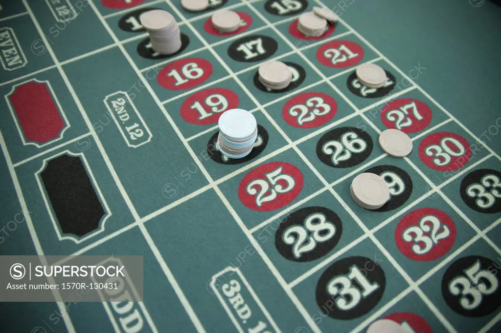 Gambling chips on a roulette table