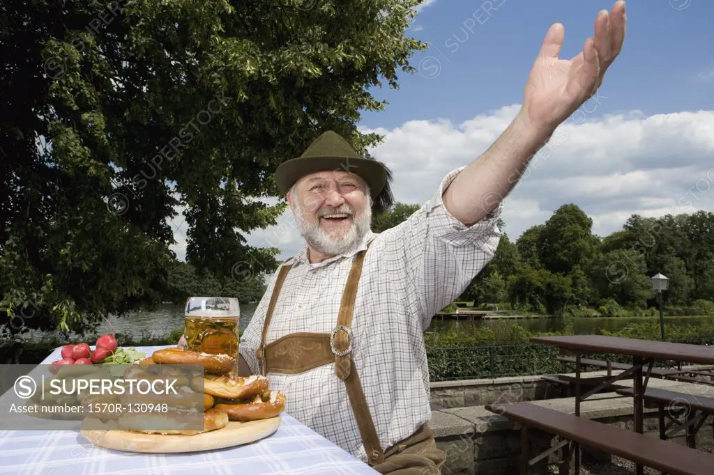 A traditionally clothed German man in a beer garden