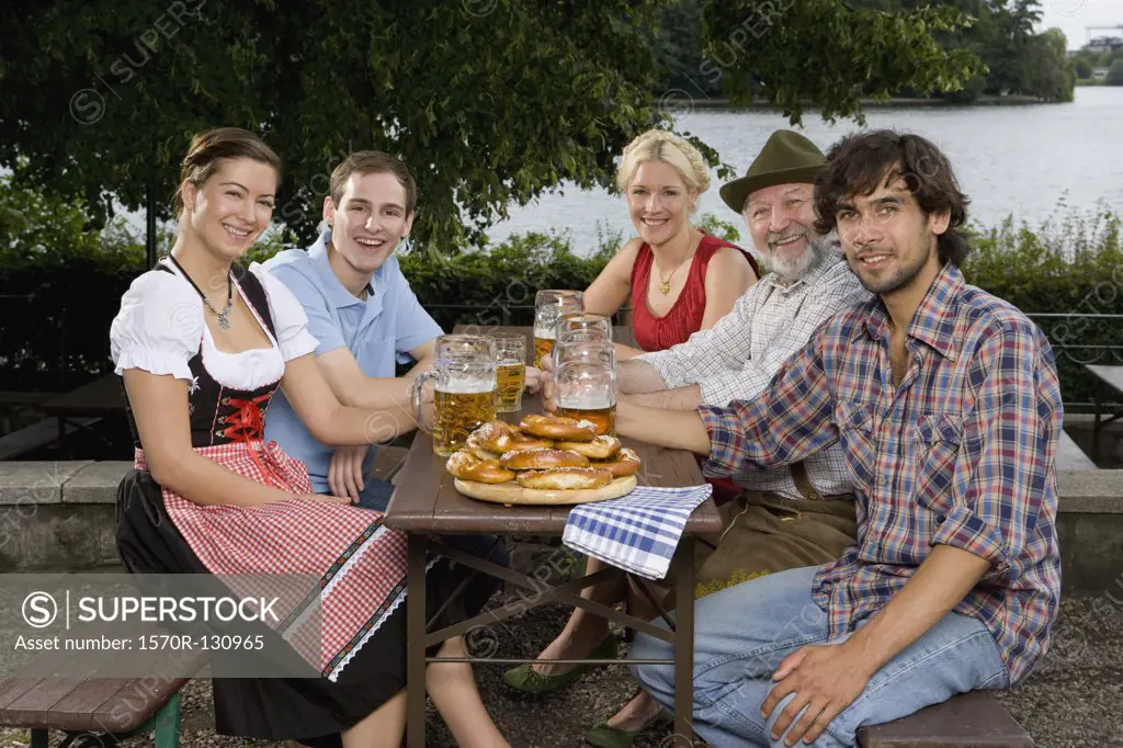 Five people sitting in a beer garden