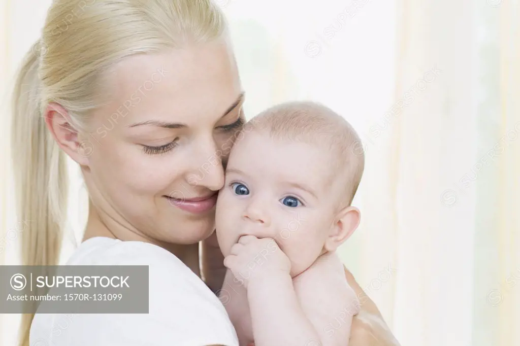 Portrait of a mother and baby daughter