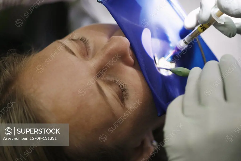 Close-up of a dental patient receiving an injection