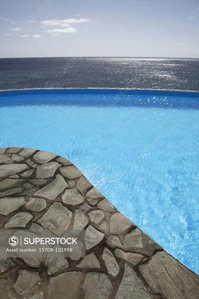 Detail of a swimming pool next to the sea