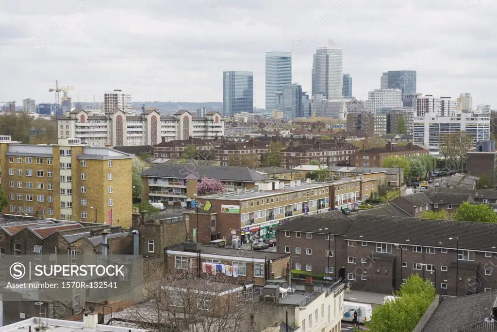View of business district behind residential district, London, England