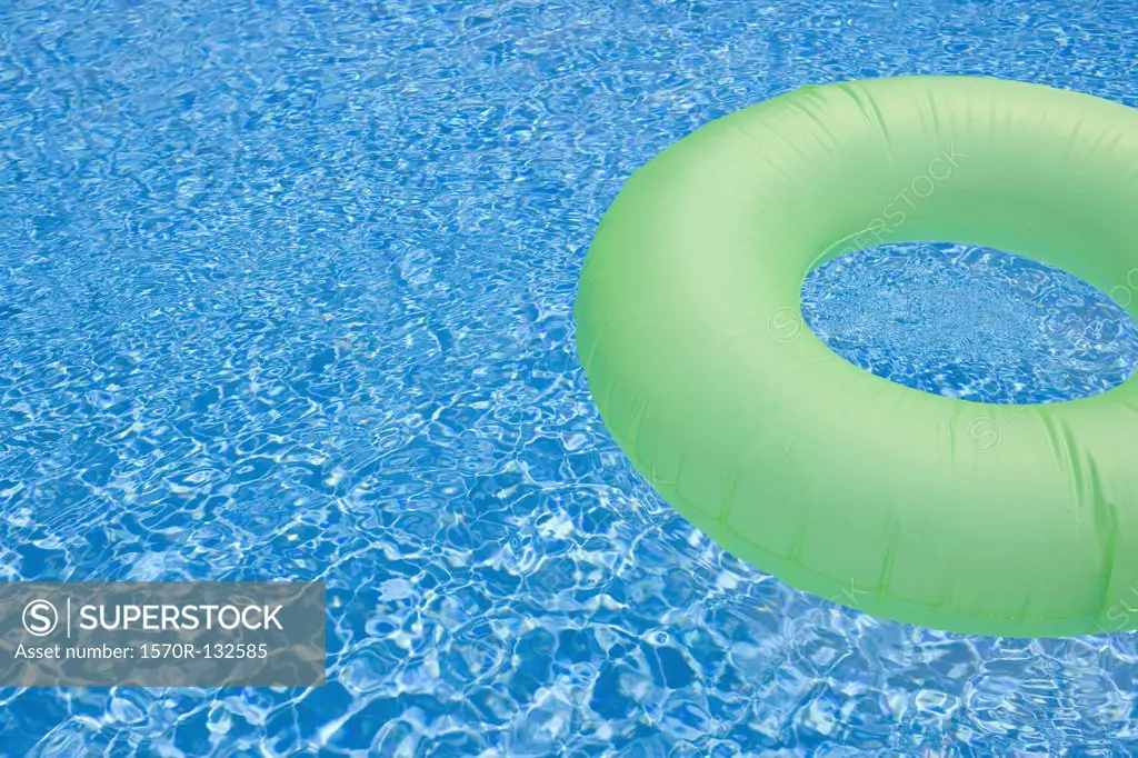 An inflatable ring in a swimming pool