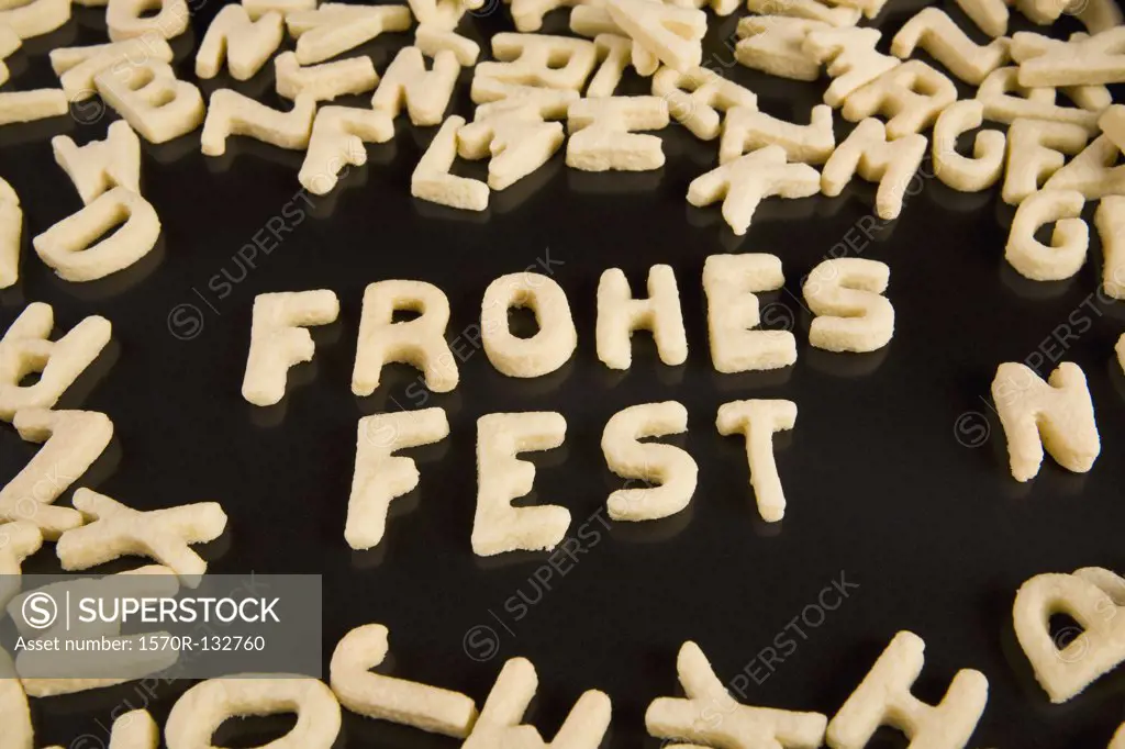 Letter cookies spelling out the German phrase Frohes Fest