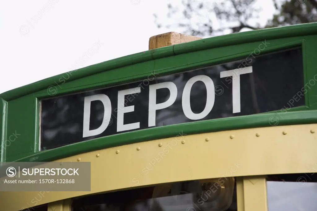 A tram with the word DEPOT written on it