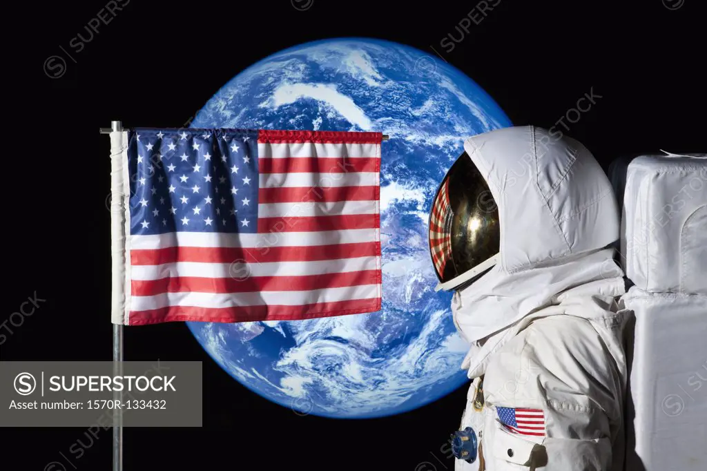 An astronaut standing by an American flag with the earth in the background