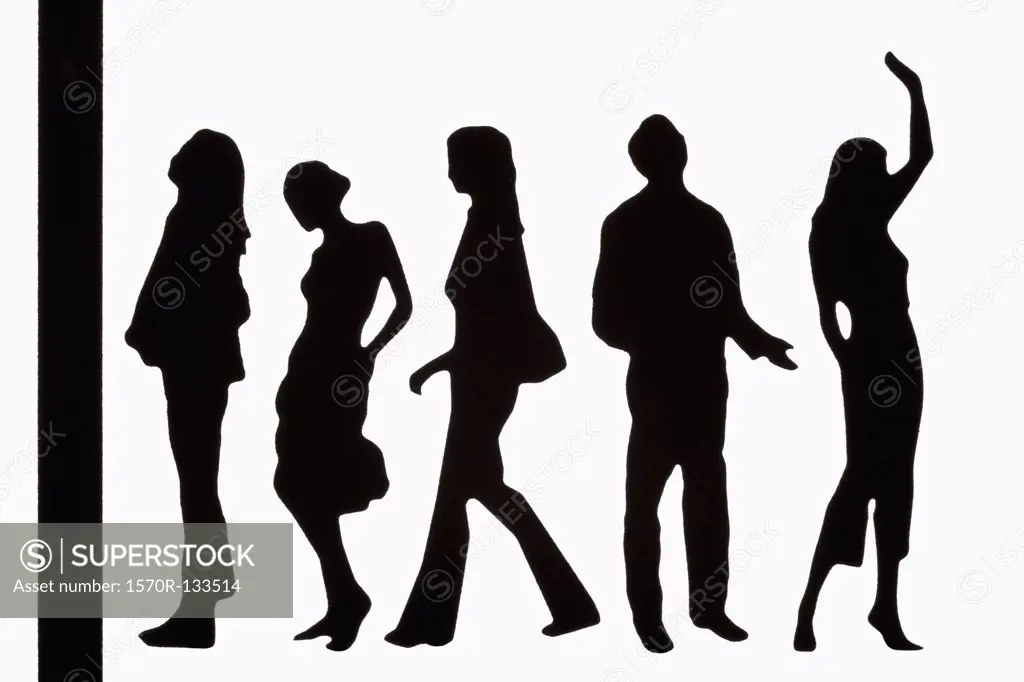 Silhouettes of fashionable plastic figurines standing in a line