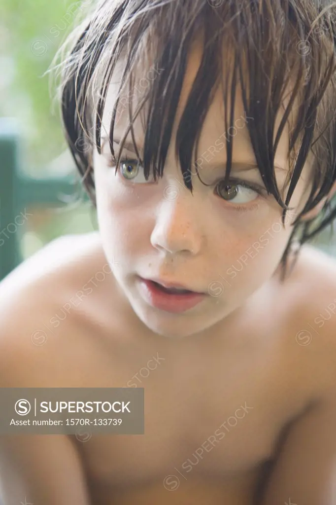 Portrait of a boy looking away