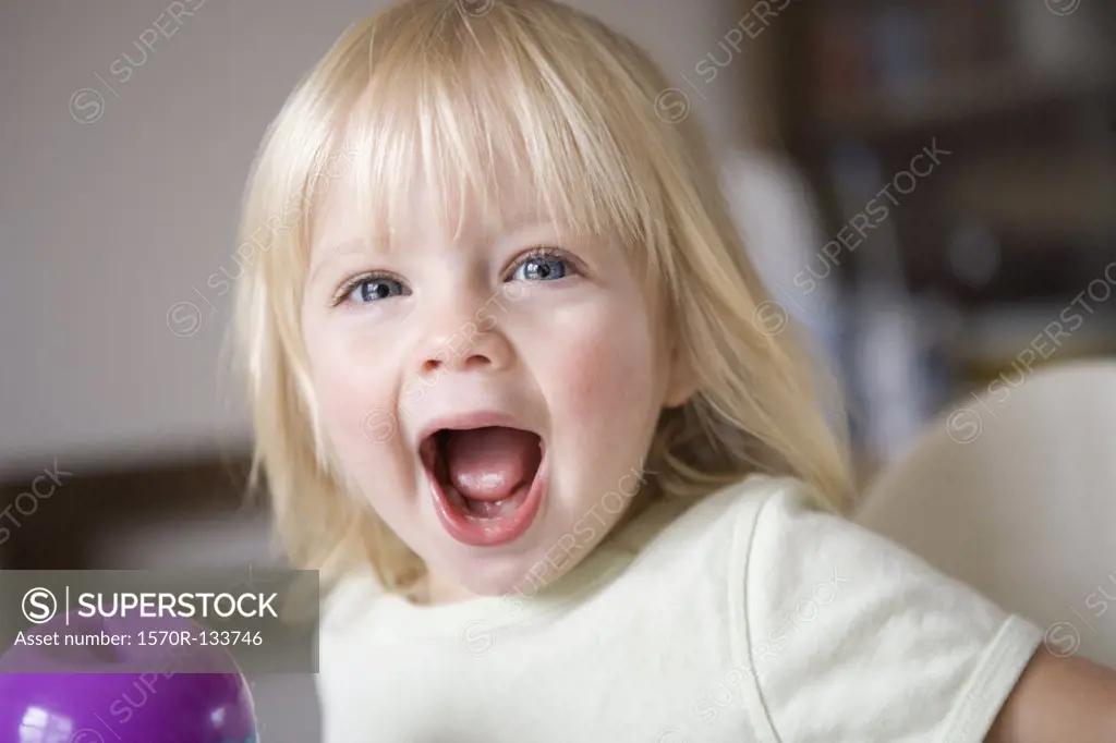 Portrait of a young girl laughing