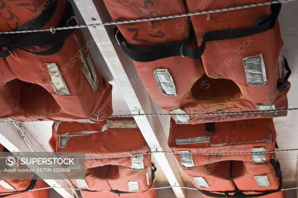 Detail of life vests stowed on a ship