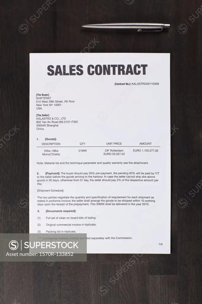 A sales contract and a pen