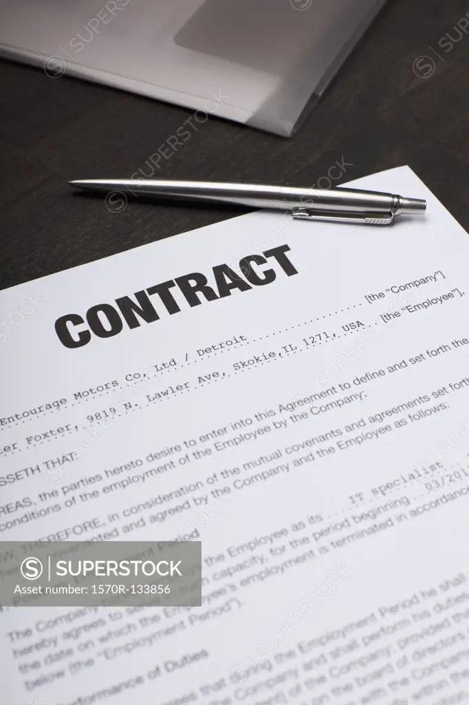 An employment contract and a pen