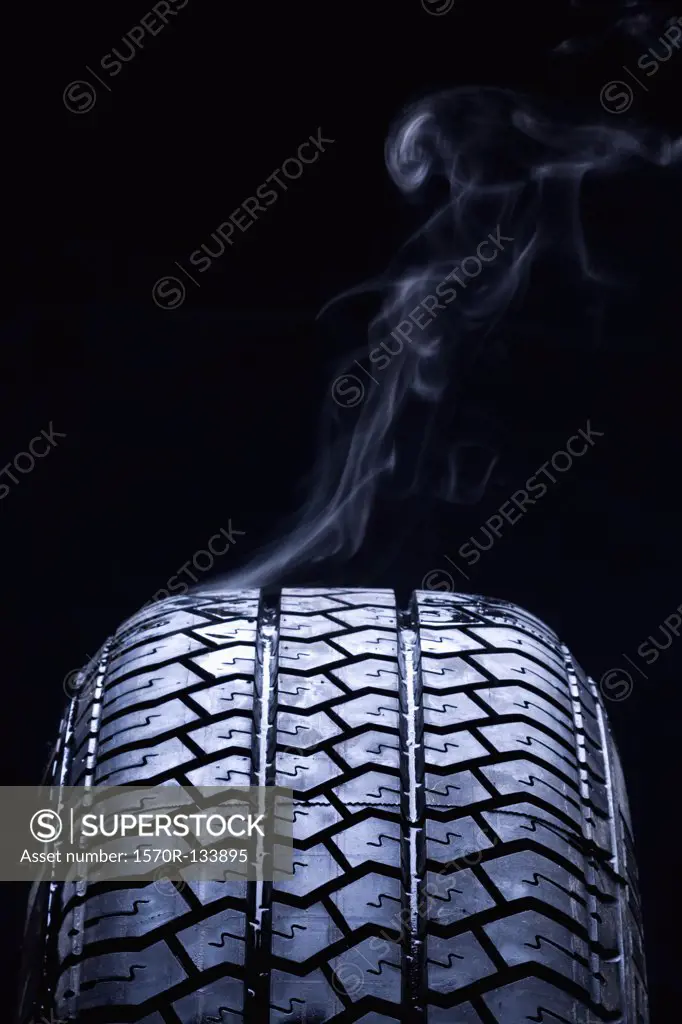 Detail of smoke coming from a car tire
