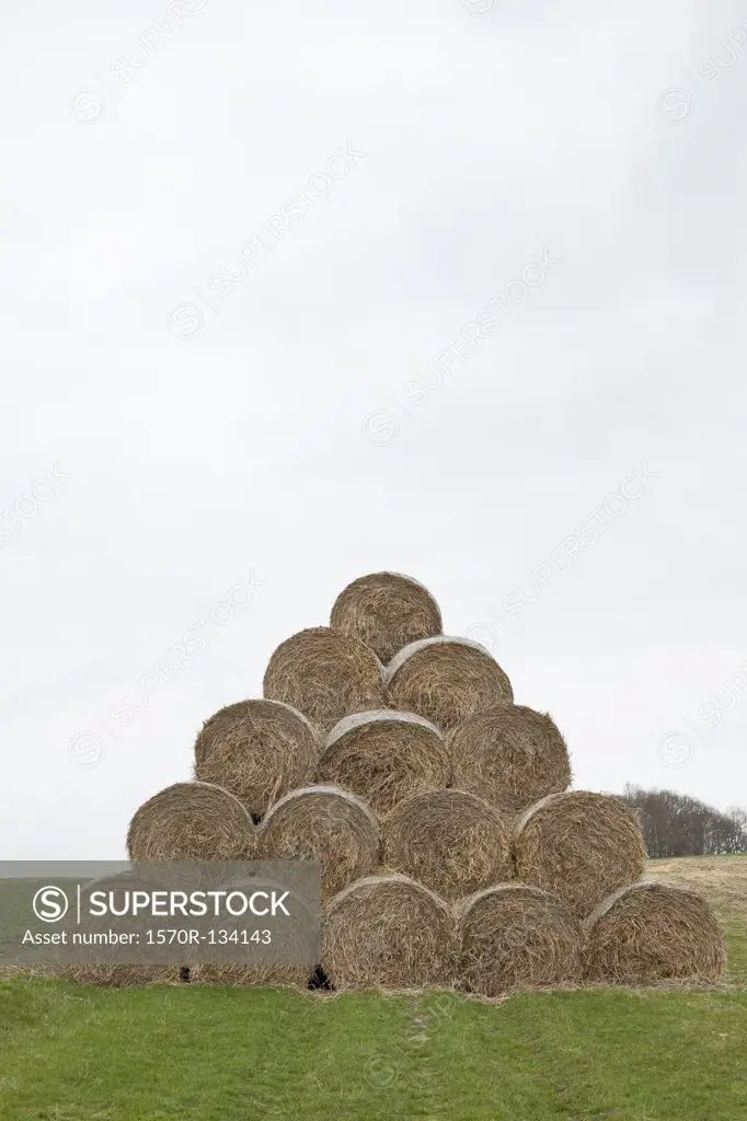 Bales of hay arranged in a pyramid