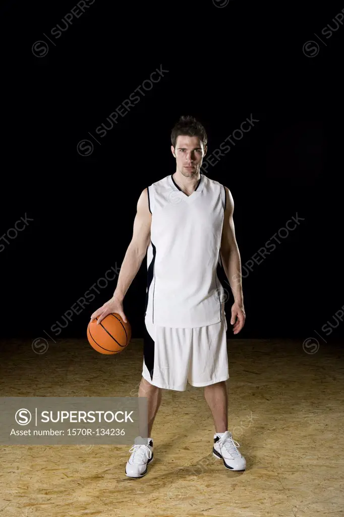 A basketball player, portrait, studio shot