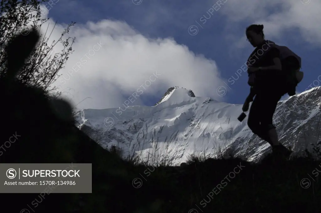 A woman hiking in Switzerland
