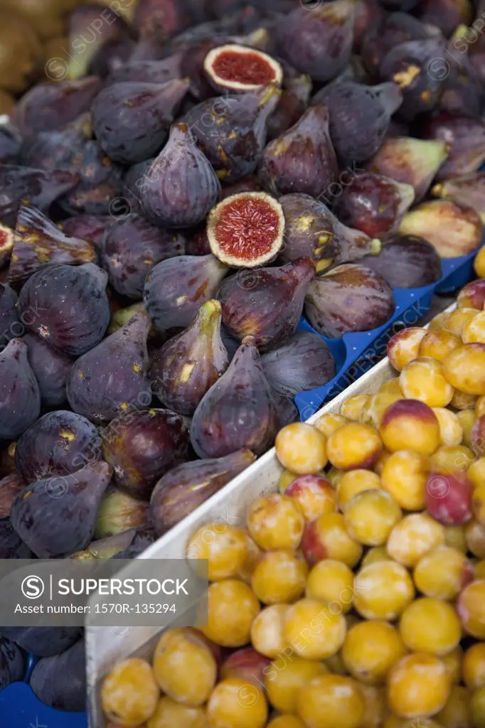 Figs and Mirabelle plums at an outdoor market