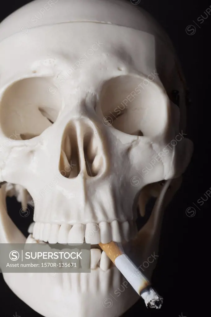 A skeleton smoking a cigarette