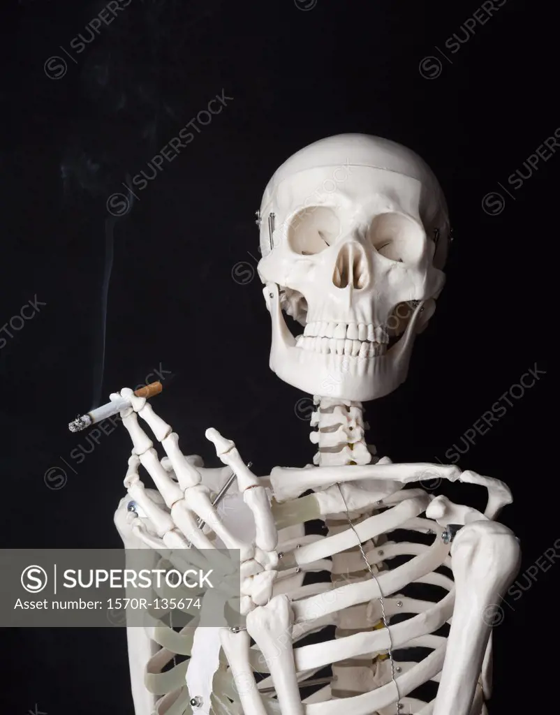 A skeleton smoking a cigarette