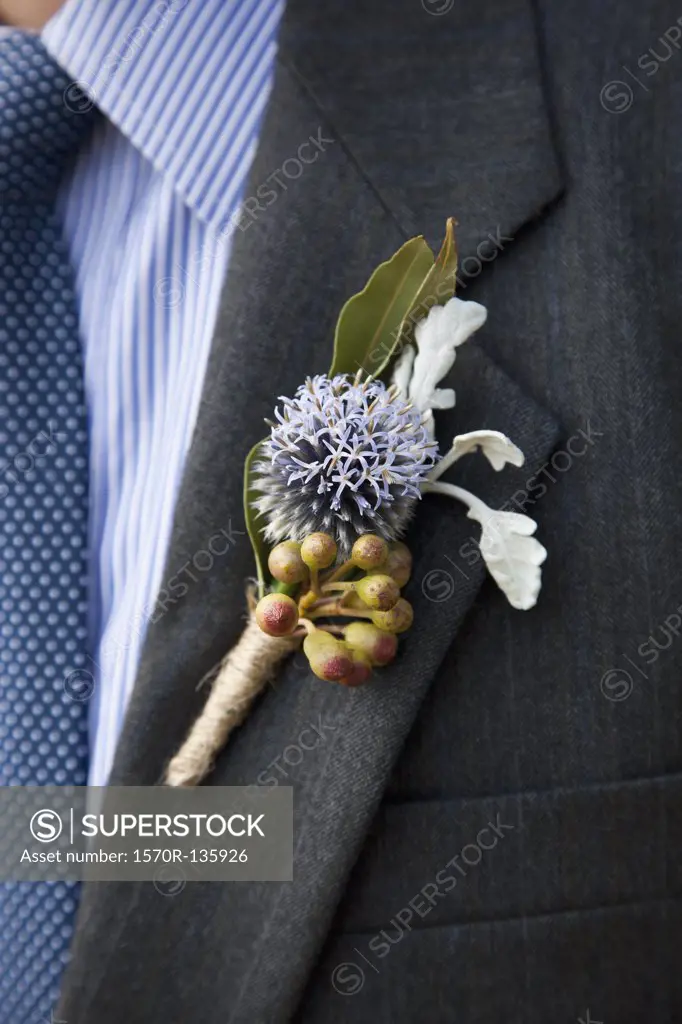 Detail of a corsage on the lapel of a man