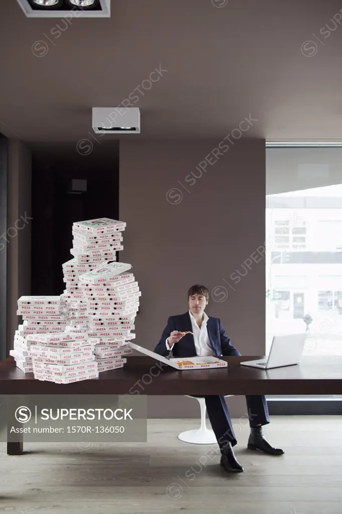 Many pizzas for businessman at home.
