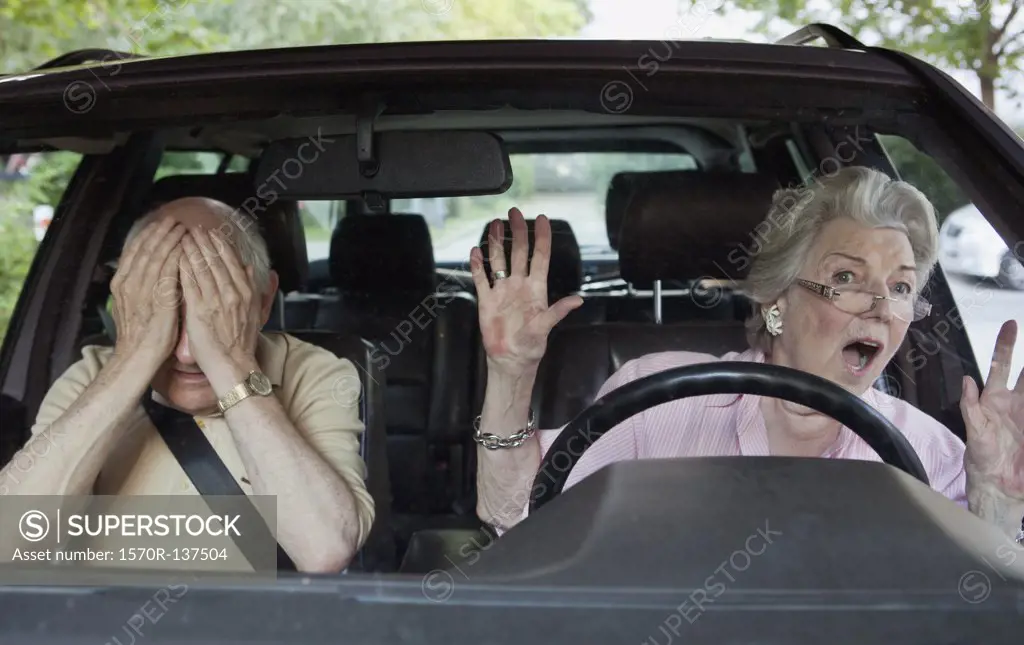 Senior woman having trouble learning to drive