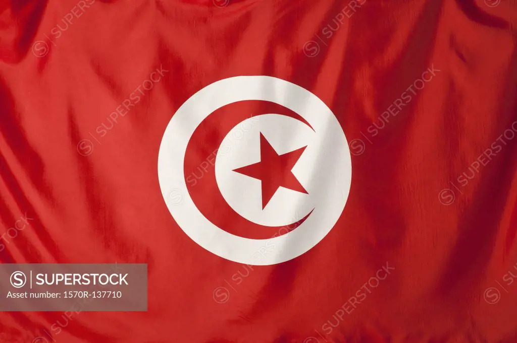 Tunisia flag, red crescent moon and red star shape in a white circle with a red background