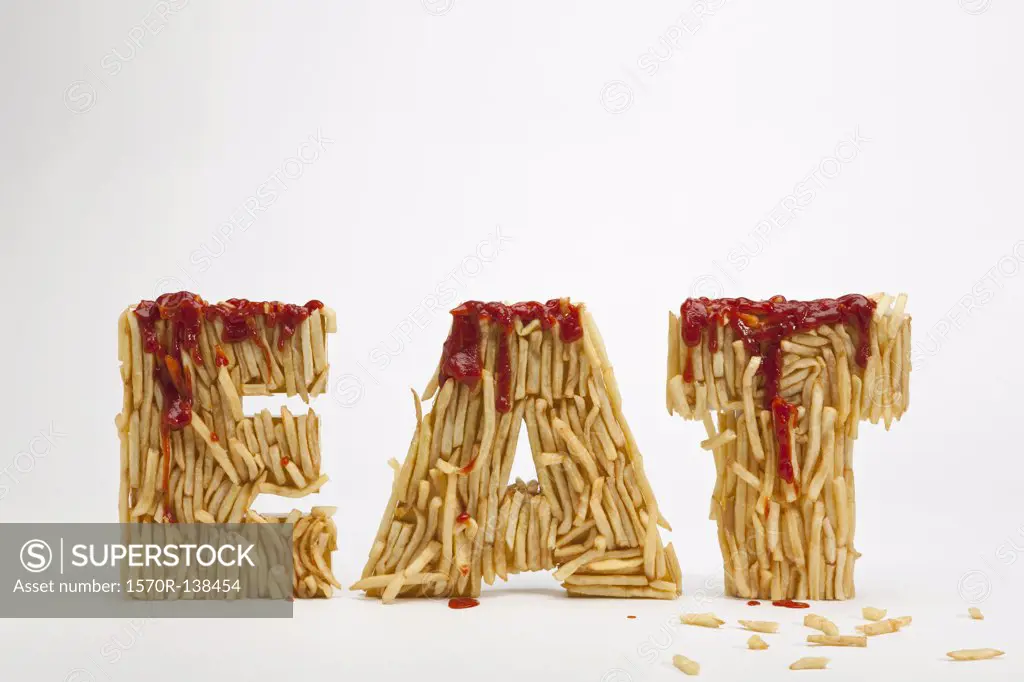 French fries molded to make the word FAT