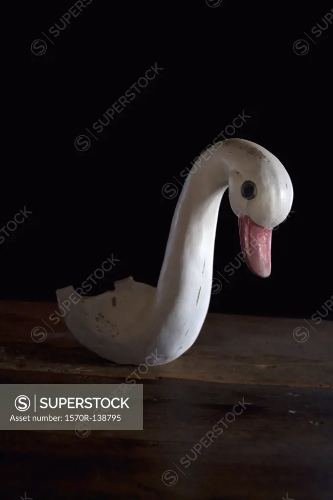 The head of a ceramic swan