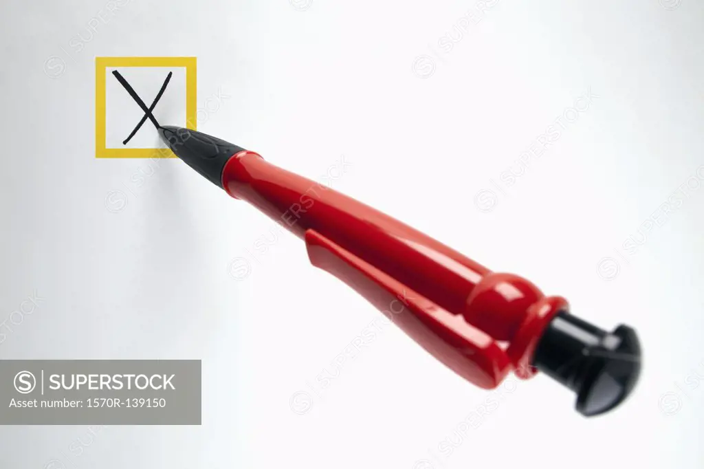 Pen marking an X in a checkbox