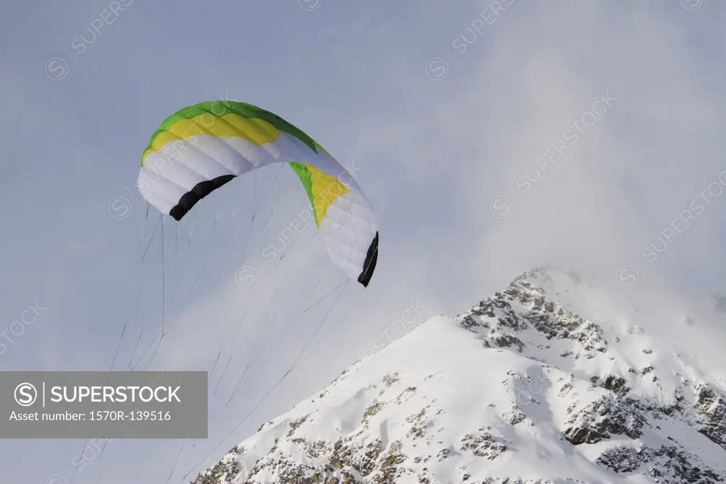 Paragliding over mountain