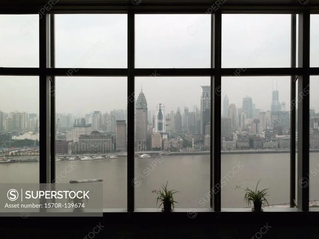 Shanghai skyline seen through window