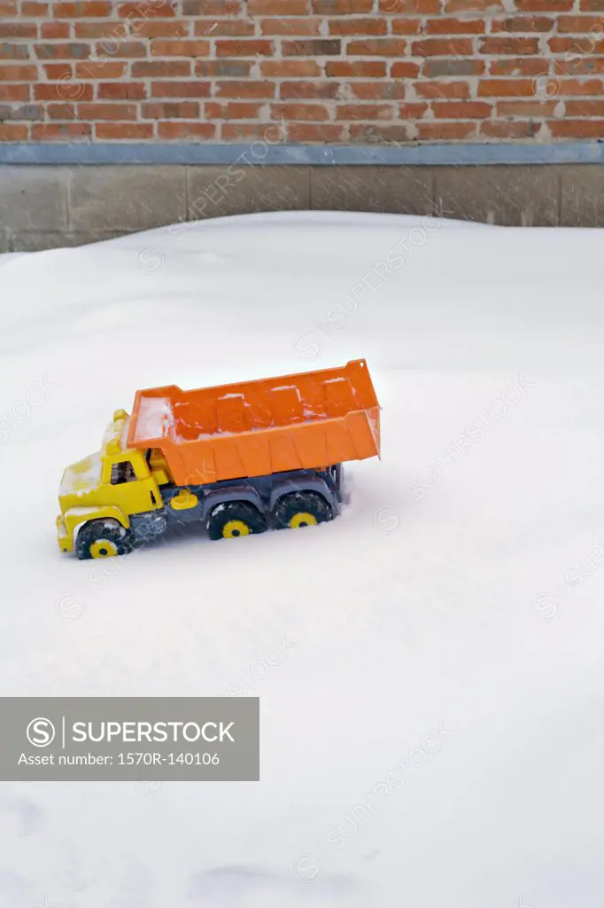 Toy Dumper truck in the snow