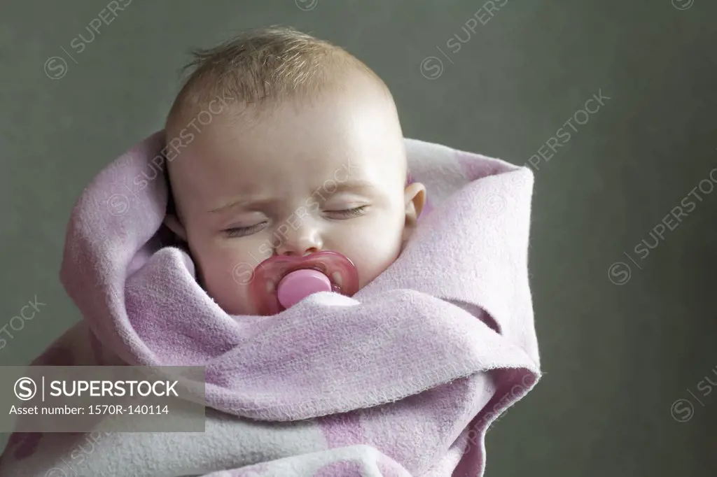 Baby girl wrapped in towel