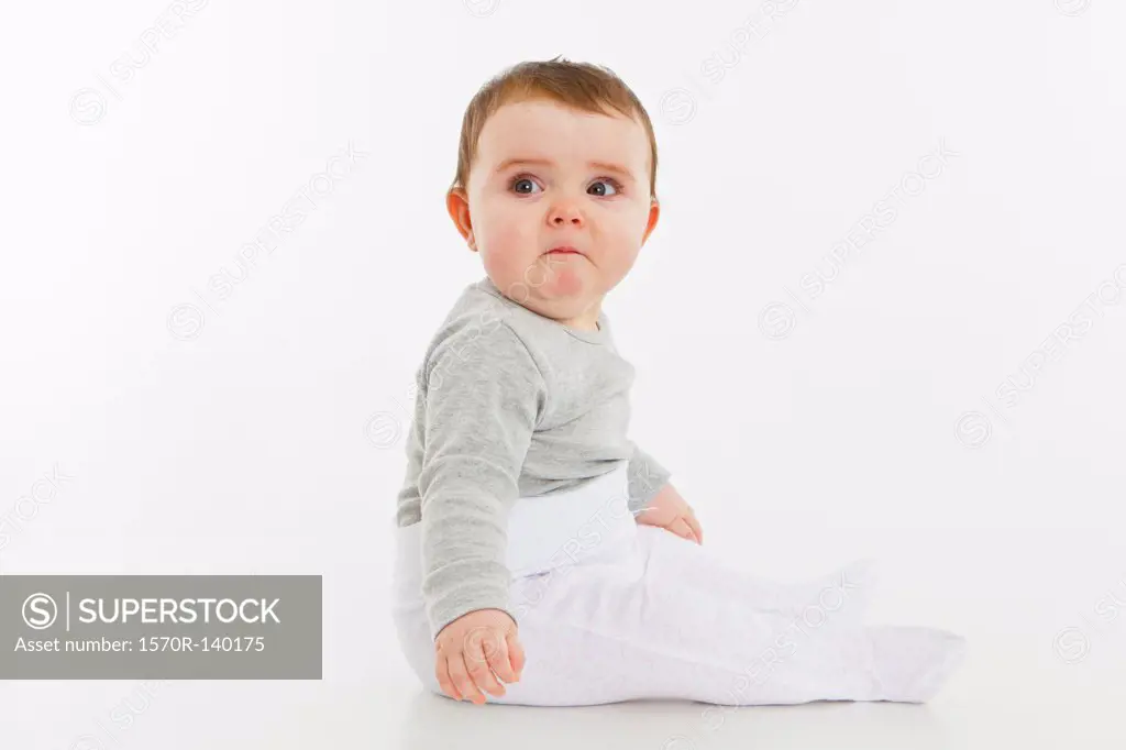 Portrait of a baby girl sitting
