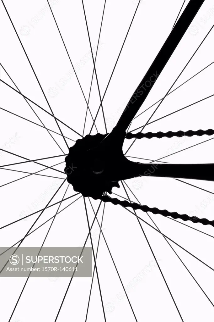Detail of a bicycle wheel, back lit, studio shot