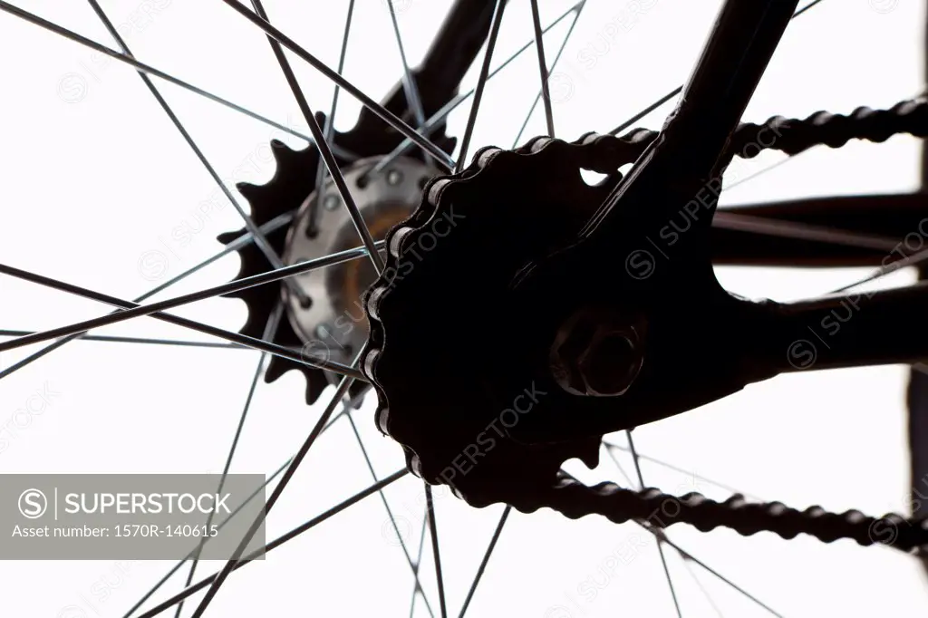 Extreme close up of chain and spokes