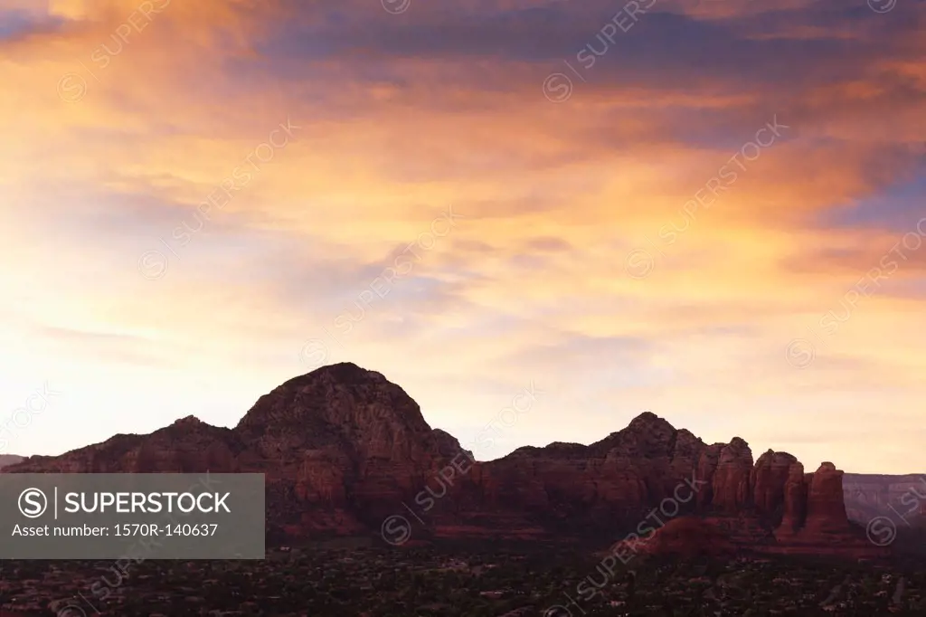 View of rock formations in a desert at sunset, Sedona, Arizona, USA