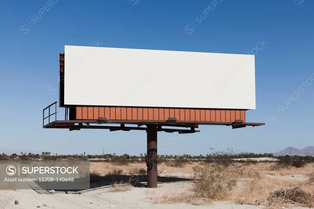A blank billboard in a desert